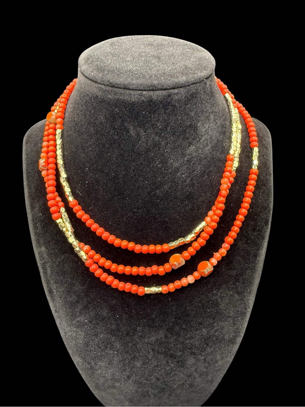 Long Red Beaded Necklace with Gold Accents